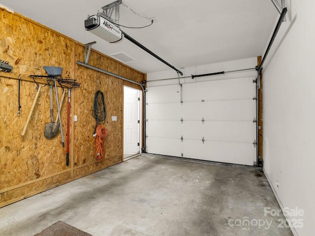 153 Old Lakey Gap Rd, Black Mountain, NC 28711 - garage featuring a garage door opener