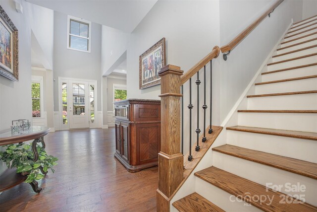 5706 Sardis Hall Ct, Charlotte, NC 28270 - staircase with a high ceiling and wood finished floors