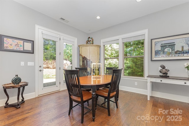 5706 Sardis Hall Ct, Charlotte, NC 28270 - dining space featuring baseboards, recessed lighting, wood finished floors, and visible vents