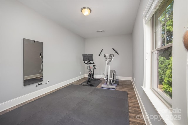 5706 Sardis Hall Ct, Charlotte, NC 28270 - workout area with baseboards, visible vents, and dark wood finished floors