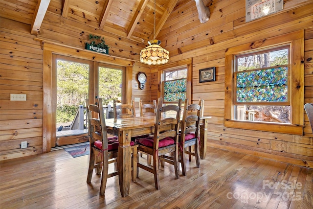 2245 Mckenzie Way N Unit 754, Old Fort, NC 28762 - dining space featuring wood walls, hardwood / wood-style floors, wood ceiling, and a chandelier