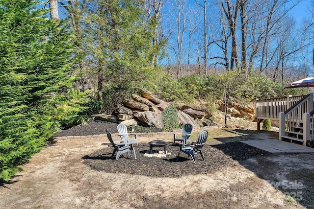 2245 Mckenzie Way N Unit 754, Old Fort, NC 28762 - view of yard featuring a wooden deck, an outdoor fire pit, and stairs