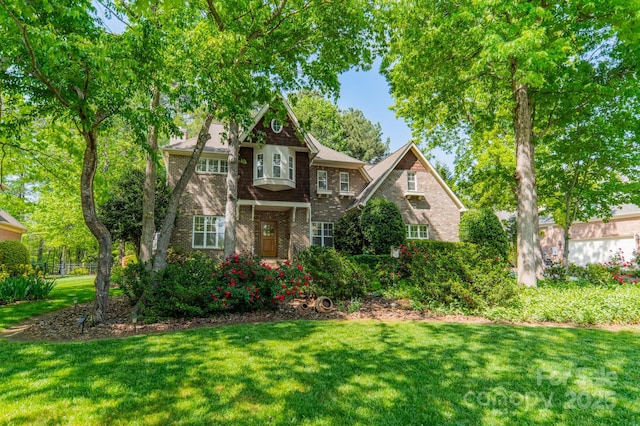 4599 Rustling Woods Dr, Denver, NC 28037 - view of front of home featuring a front lawn and brick siding