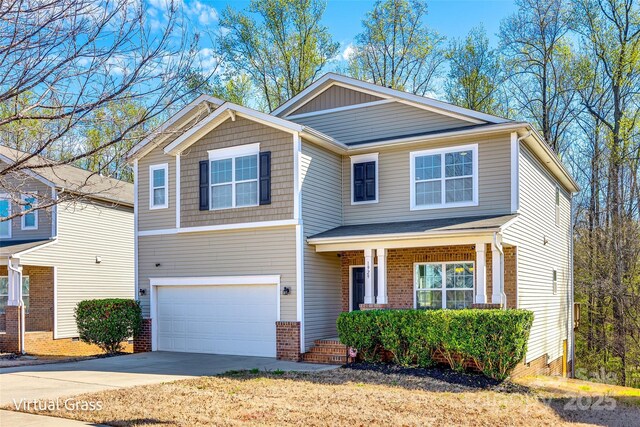 1929 Shorthorn St, Charlotte, NC 28213 - craftsman inspired home featuring brick siding, concrete driveway, and a garage