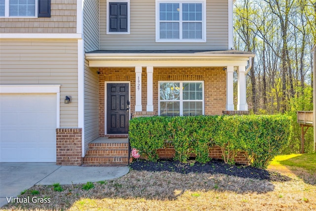 1929 Shorthorn St, Charlotte, NC 28213 - entrance to property featuring covered porch, brick siding, and a garage
