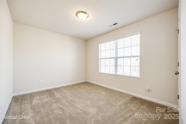 1929 Shorthorn St, Charlotte, NC 28213 - empty room featuring baseboards, visible vents, and carpet floors