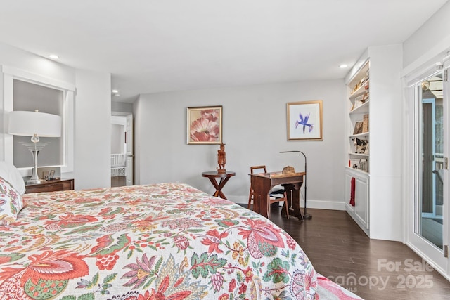 bedroom with dark wood finished floors, baseboards, and recessed lighting