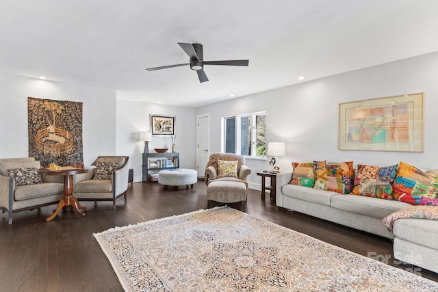 living room with a ceiling fan, dark wood-style floors, and recessed lighting