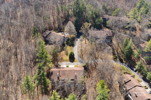 aerial view featuring a view of trees