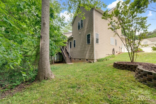 6414 Winding Creek Ln, Denver, NC 28037 - view of property exterior featuring stairs, crawl space, and a yard