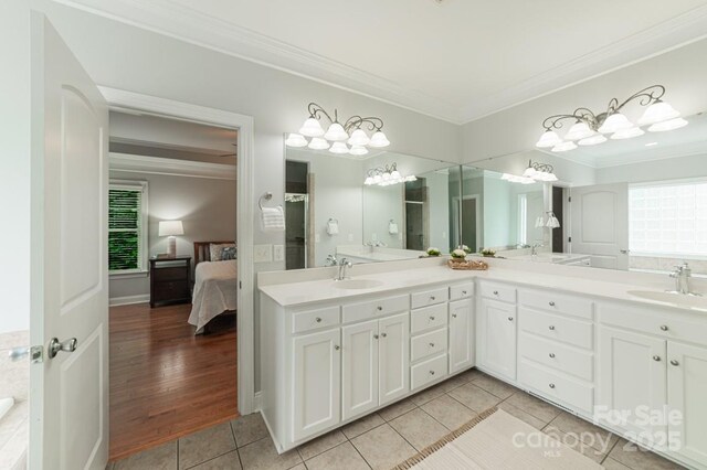 6414 Winding Creek Ln, Denver, NC 28037 - ensuite bathroom with ornamental molding, tile patterned floors, and double vanity