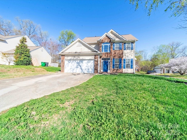 14802 Rolling Sky Dr, Charlotte, NC 28273 - view of front of house featuring an attached garage, brick siding, concrete driveway, and a front yard
