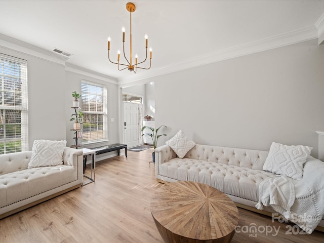 14802 Rolling Sky Dr, Charlotte, NC 28273 - living area with visible vents, wood finished floors, ornamental molding, and a chandelier