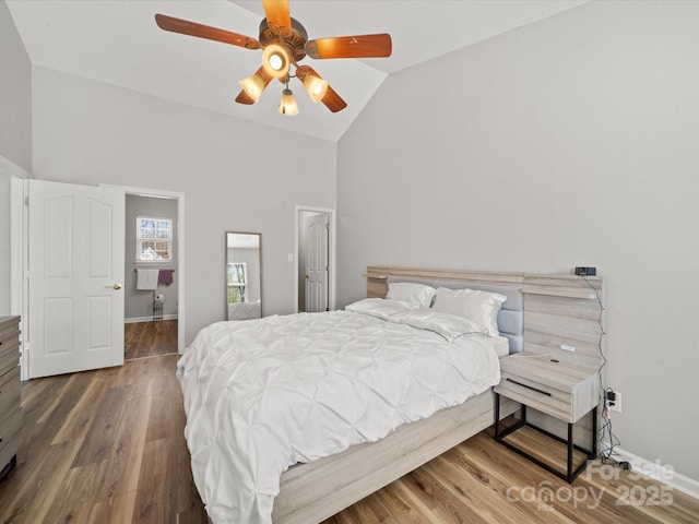 14802 Rolling Sky Dr, Charlotte, NC 28273 - bedroom featuring baseboards, vaulted ceiling, wood finished floors, and a ceiling fan