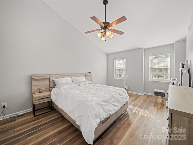 14802 Rolling Sky Dr, Charlotte, NC 28273 - bedroom featuring baseboards, ceiling fan, light wood-style flooring, and vaulted ceiling