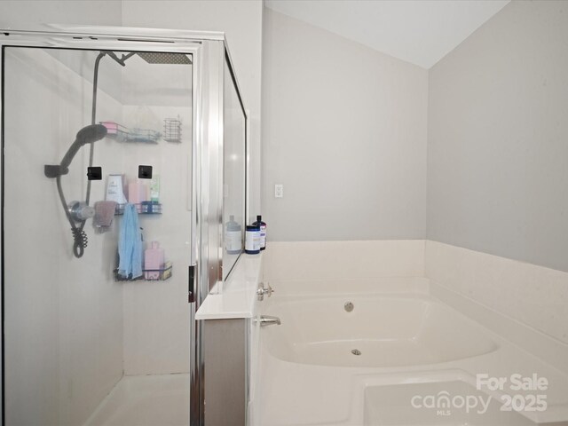 14802 Rolling Sky Dr, Charlotte, NC 28273 - bathroom featuring a garden tub and a stall shower