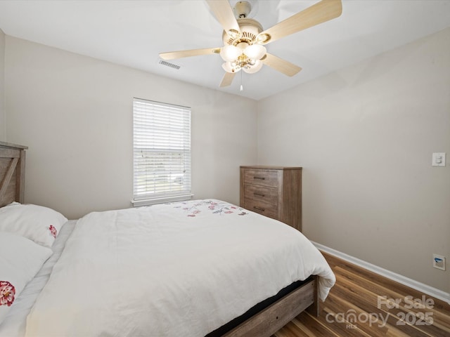 14802 Rolling Sky Dr, Charlotte, NC 28273 - bedroom with baseboards, visible vents, wood finished floors, and ceiling fan