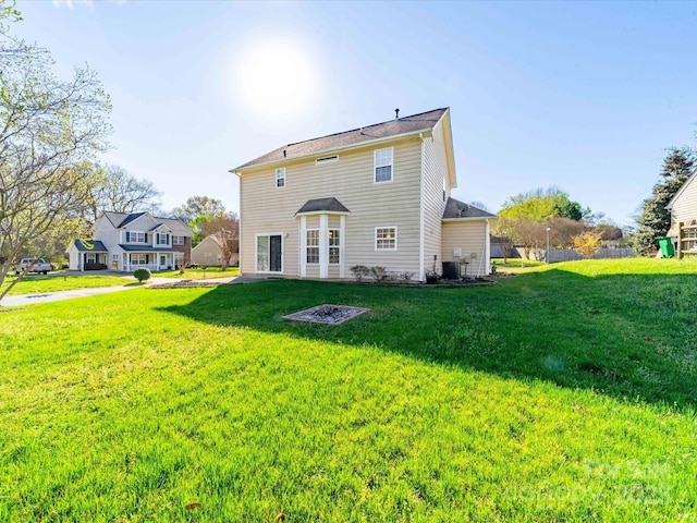 14802 Rolling Sky Dr, Charlotte, NC 28273 - rear view of house with central AC unit and a yard
