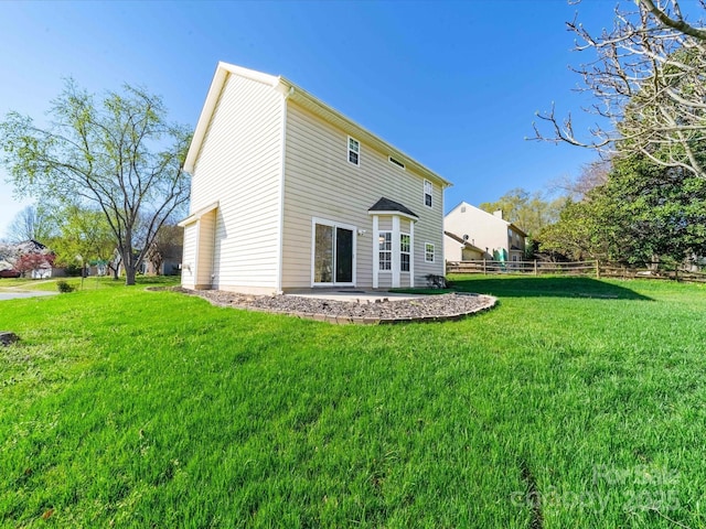 14802 Rolling Sky Dr, Charlotte, NC 28273 - back of house with a lawn, fence, and a patio area