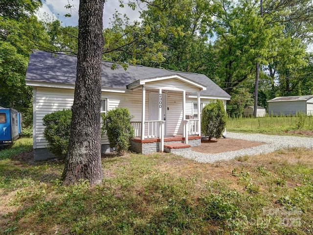 2300 Kennesaw Dr, Charlotte, NC 28216 - view of front of property with roof with shingles and a porch