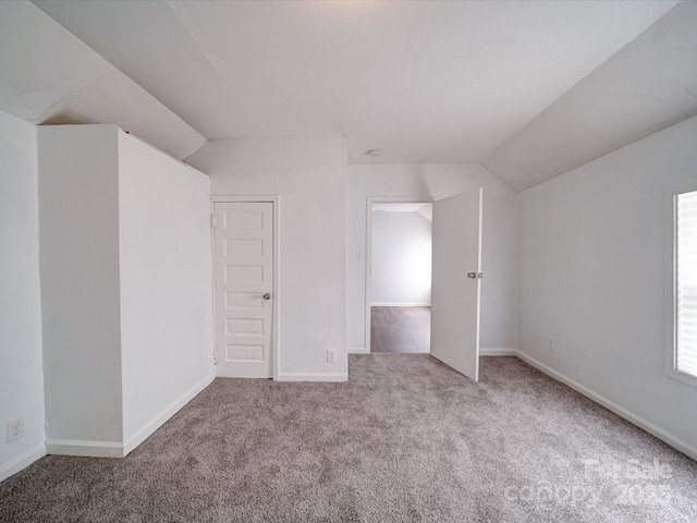 2300 Kennesaw Dr, Charlotte, NC 28216 - bonus room featuring carpet floors, baseboards, and vaulted ceiling
