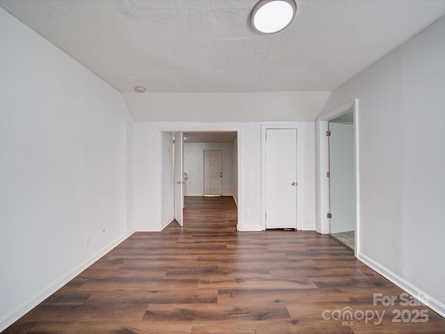 2300 Kennesaw Dr, Charlotte, NC 28216 - spare room with baseboards and wood finished floors