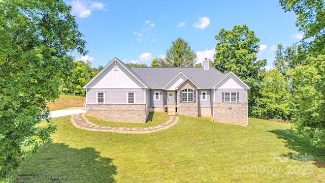 21 Willie Ln, Weaverville, NC 28787 - ranch-style house featuring stone siding, a chimney, a front yard, and board and batten siding