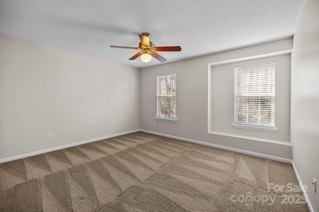 11929 Kings Castle Ct, Charlotte, NC 28277 - carpeted empty room featuring a ceiling fan, baseboards, and a textured ceiling