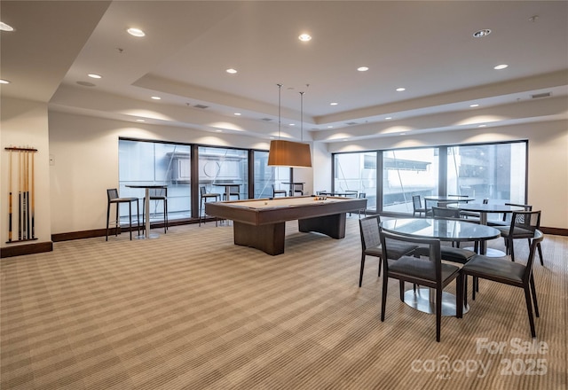 rec room with light carpet, baseboards, a tray ceiling, and recessed lighting