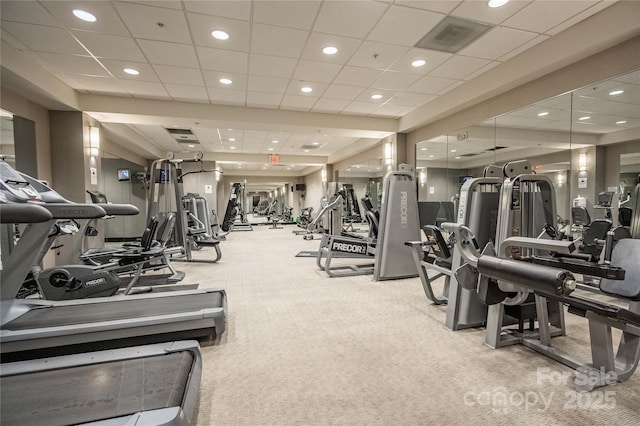 gym featuring a paneled ceiling, carpet floors, visible vents, and recessed lighting