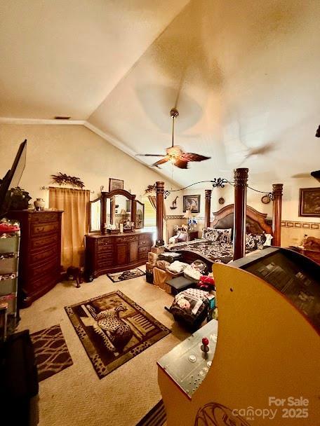 carpeted bedroom with vaulted ceiling and visible vents