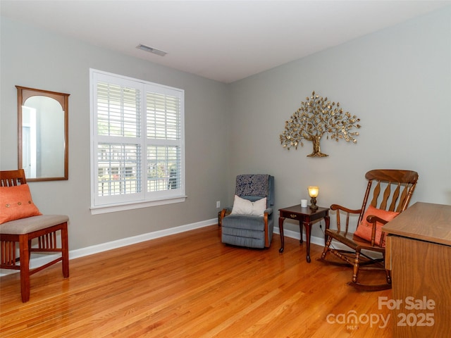 706 Springwood Dr Unit 14, Waxhaw, NC 28173 - sitting room with visible vents, baseboards, and light wood-type flooring