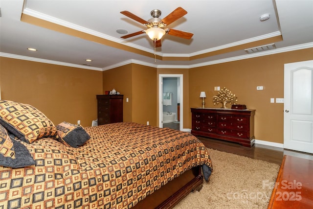 706 Springwood Dr Unit 14, Waxhaw, NC 28173 - bedroom with visible vents, baseboards, crown molding, and wood finished floors