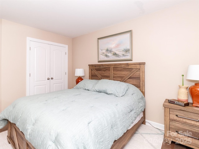 706 Springwood Dr Unit 14, Waxhaw, NC 28173 - bedroom with a closet and baseboards