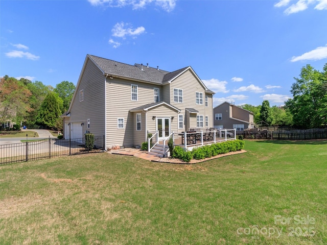 706 Springwood Dr Unit 14, Waxhaw, NC 28173 - rear view of property featuring driveway, french doors, an attached garage, a yard, and fence