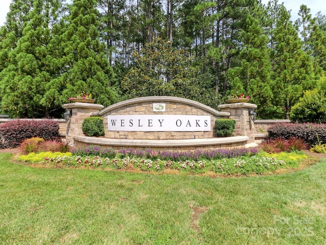 706 Springwood Dr Unit 14, Waxhaw, NC 28173 - community / neighborhood sign featuring a lawn