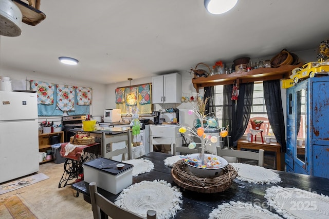 dining area with concrete floors