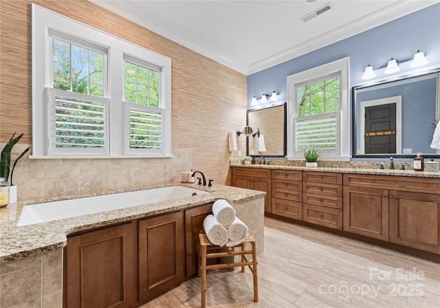 18420 Rosapenny Rd, Charlotte, NC 28278 - bathroom with healthy amount of natural light, a bath, double vanity, and crown molding