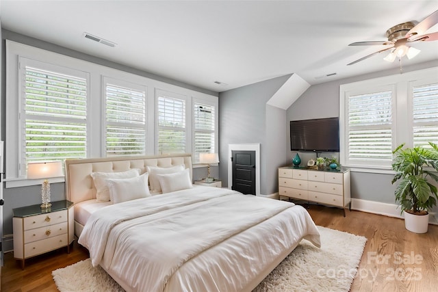 18420 Rosapenny Rd, Charlotte, NC 28278 - bedroom featuring wood finished floors, ceiling fan, and baseboards