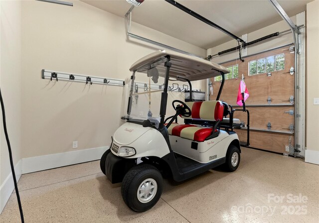 18420 Rosapenny Rd, Charlotte, NC 28278 - garage with baseboards