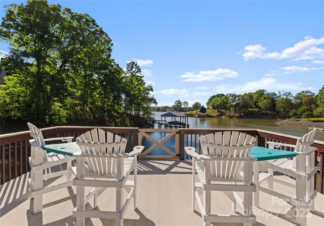 18420 Rosapenny Rd, Charlotte, NC 28278 - wooden deck featuring a water view