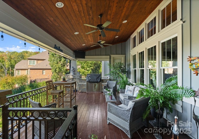 18420 Rosapenny Rd, Charlotte, NC 28278 - deck with a ceiling fan, a grill, and an outdoor living space