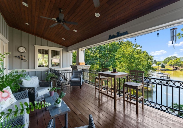 18420 Rosapenny Rd, Charlotte, NC 28278 - wooden deck featuring a ceiling fan and a water view