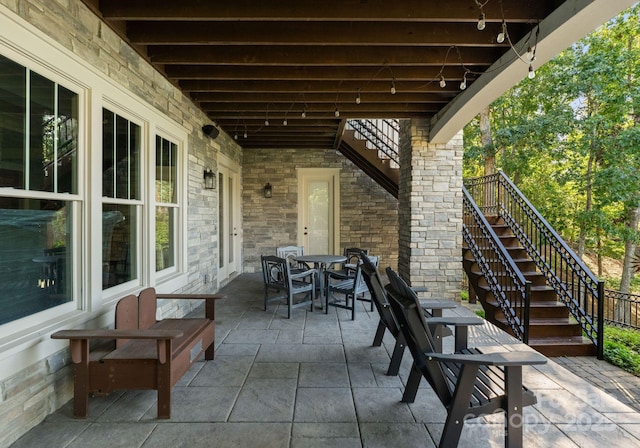 18420 Rosapenny Rd, Charlotte, NC 28278 - view of patio with stairs and outdoor dining space