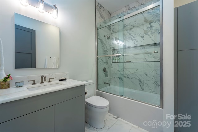 158 Riverbend Forest Dr Unit 15, Asheville, NC 28805 - full bathroom featuring toilet, marble look tile flooring, vanity, and enclosed tub / shower combo