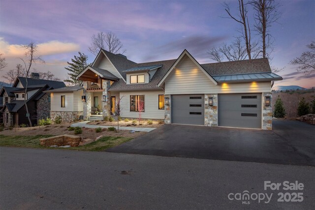 158 Riverbend Forest Dr Unit 15, Asheville, NC 28805 - view of front of house with stone siding, asphalt driveway, an attached garage, and a shingled roof