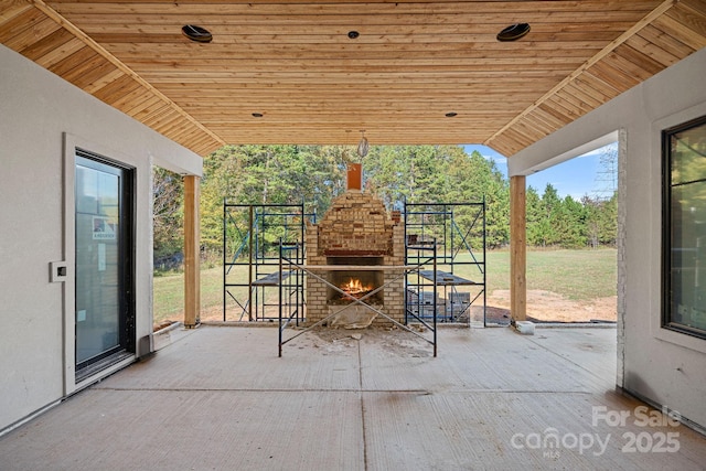 5039 Eliza Long Wilkie Dr, Huntersville, NC 28078 - view of patio / terrace featuring an outdoor brick fireplace