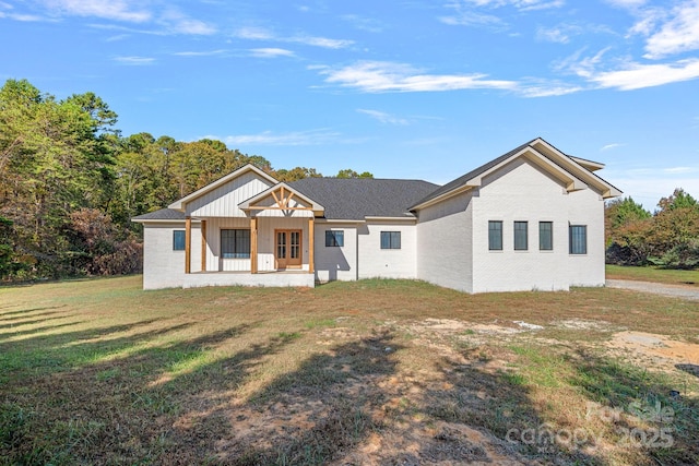 5039 Eliza Long Wilkie Dr, Huntersville, NC 28078 - view of front of house featuring a front lawn and board and batten siding