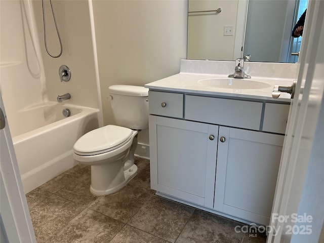 bathroom featuring toilet, shower / bath combination, and vanity