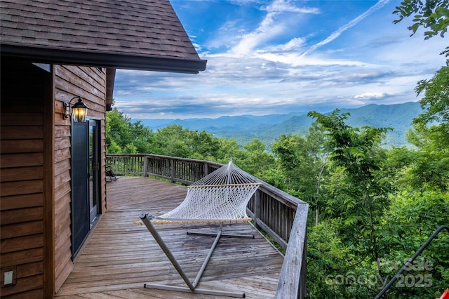 wooden terrace featuring a mountain view